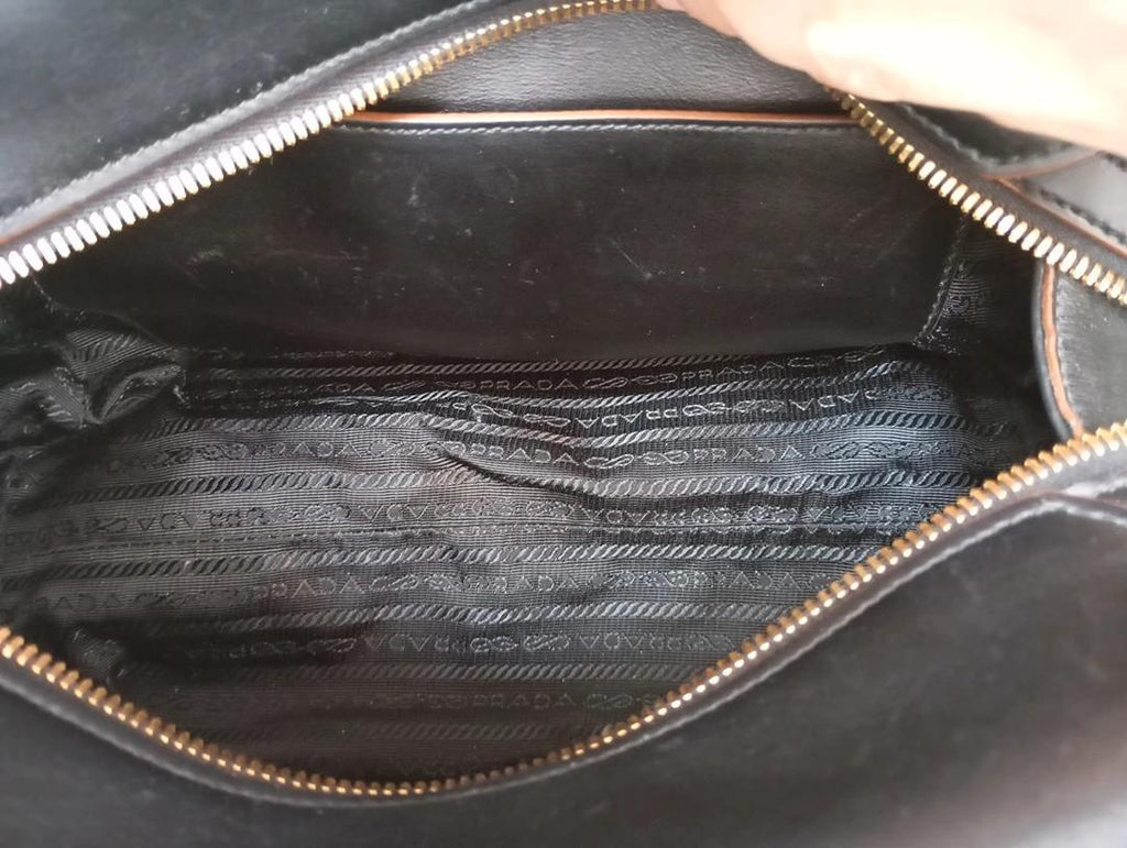 Sac à main Prada bandoulière - cuir - noir et marron - modèle Top Handle Vintage , collection Vitello Phoenix de Prada