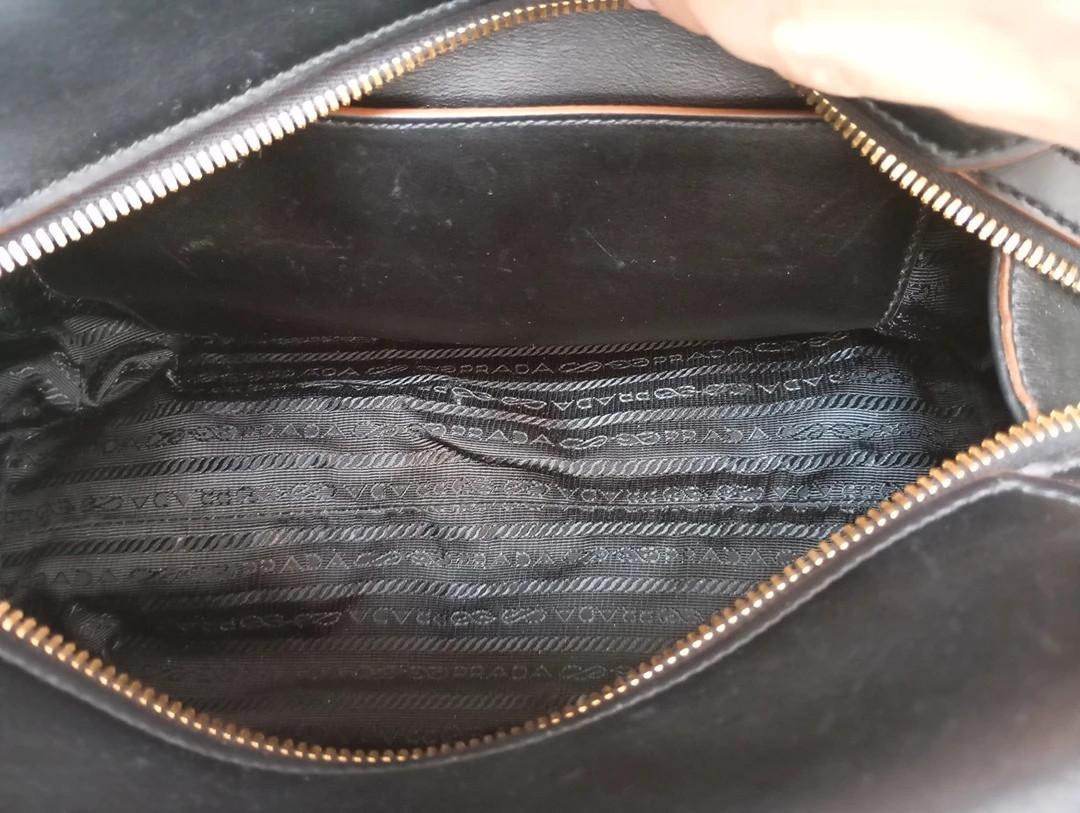 Sac à main Prada bandoulière - cuir - noir et marron - modèle Top Handle Vintage , collection Vitello Phoenix de Prada