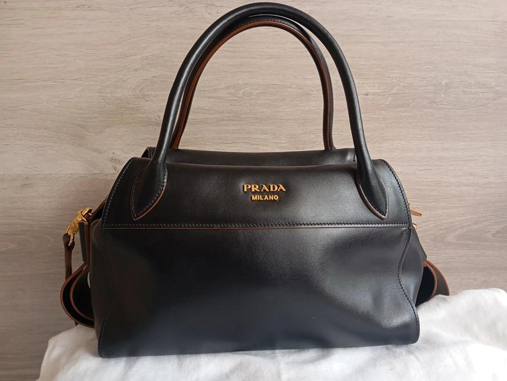 Sac à main Prada bandoulière - cuir - noir et marron - modèle Top Handle Vintage , collection Vitello Phoenix de Prada