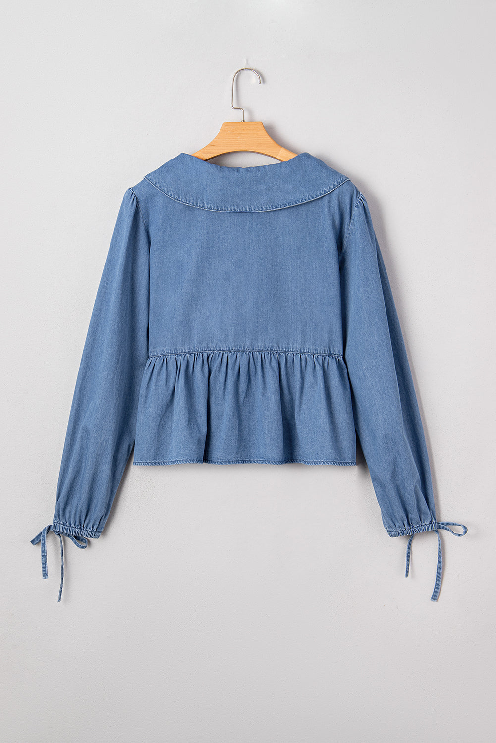 Haut Péplum Denim Bleu Crépuscule — Col en V à Nouer et Manches Ballon