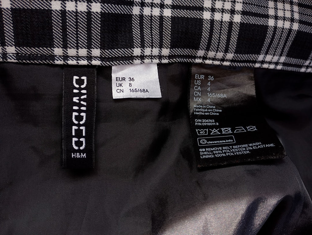 Mini-jupe à carreaux noir & blanc — H&M — Taille 36 — Très bon état