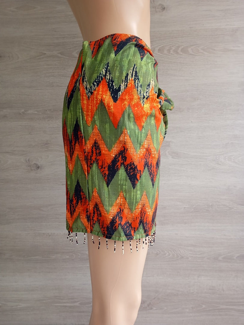 Mini-jupe portefeuille Micas - S - vert/orange avec perles - neuve