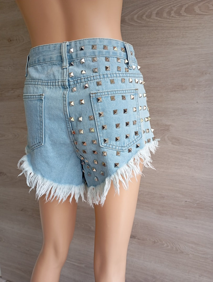 Shorts court fille femme en jeans bleu clair avec clous Xs très bon état avec franges