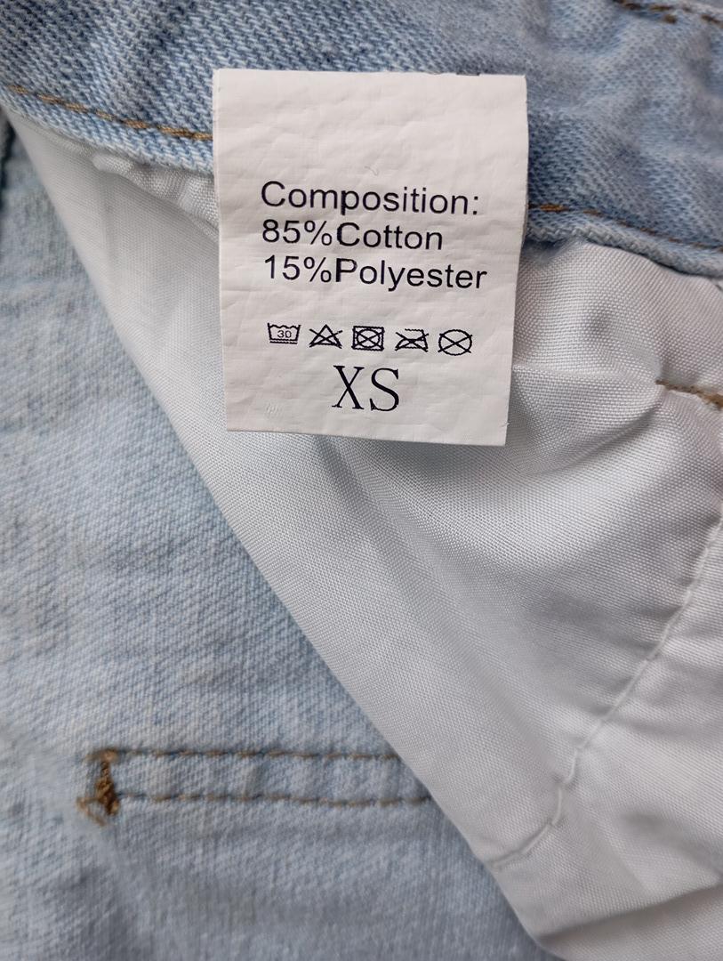 Shorts court fille femme en jeans bleu clair avec clous Xs très bon état avec franges