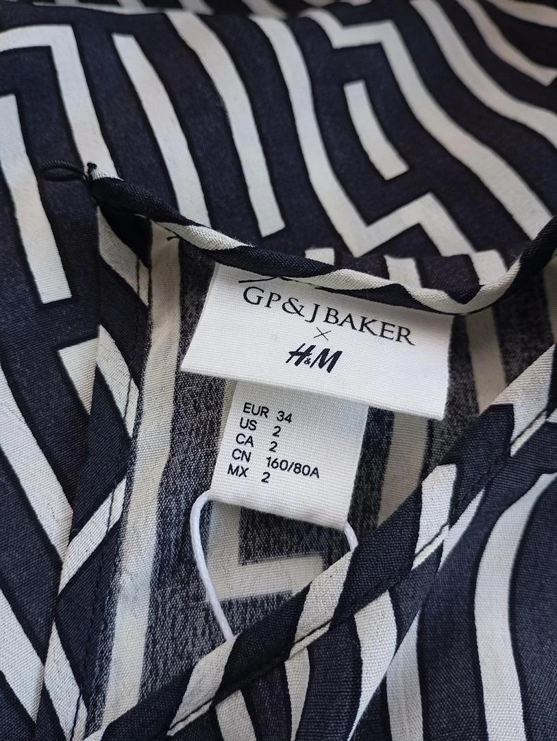 Belle blouse manches courtes H&m taille Xs - Noir/blanc - 100% viscose avec motifs