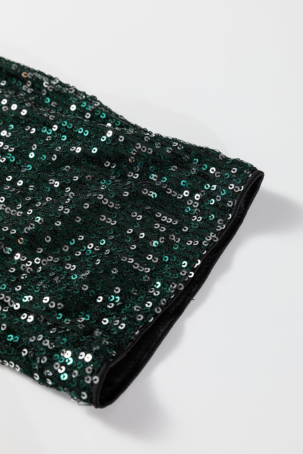 Top blazer à sequins vert sapin — col V ouvert, manches longues