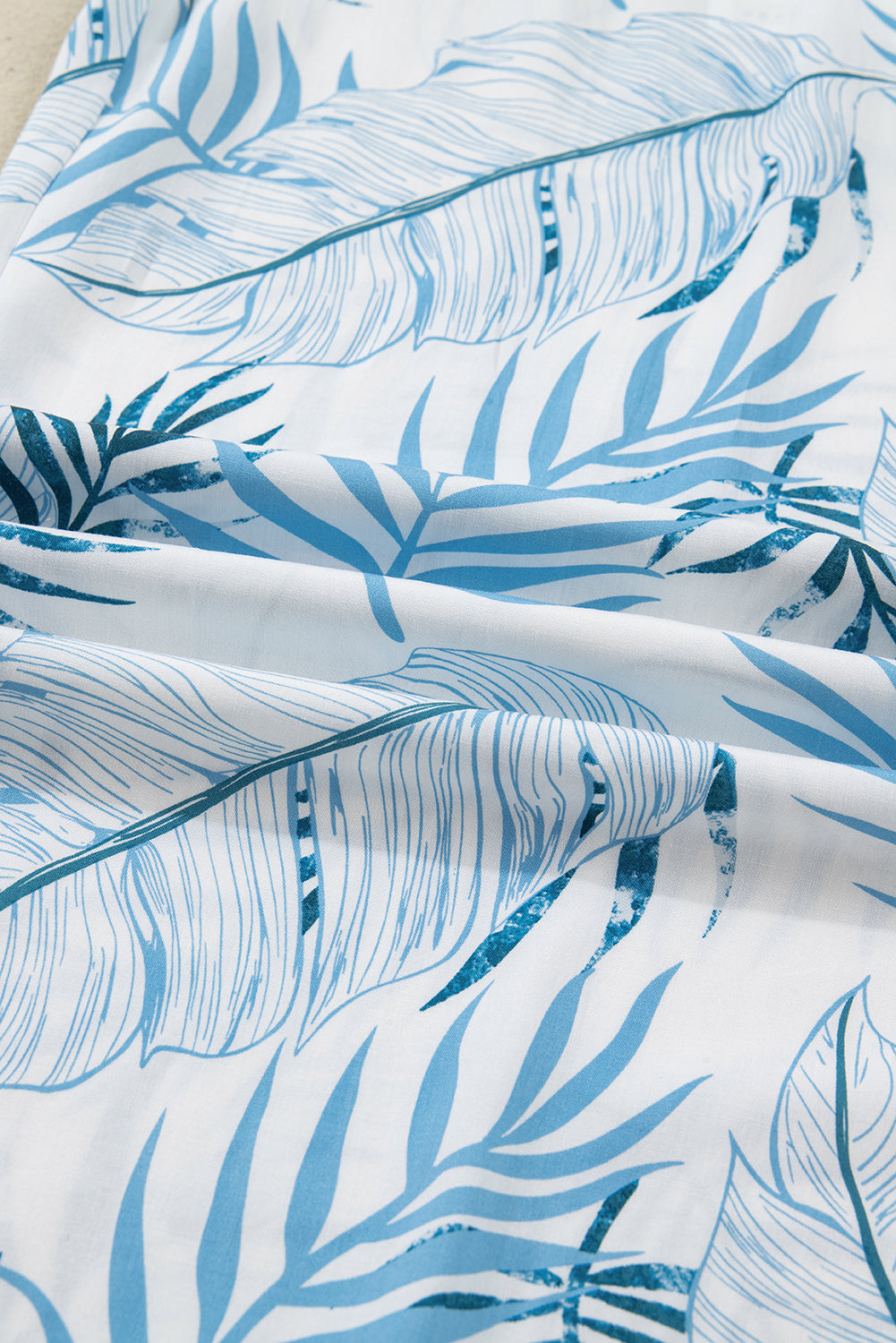 Pantalon large à imprimé botanique bleu ciel et taille froncée