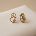 Boucles d'oreilles asymétriques - une creuse, une pleine