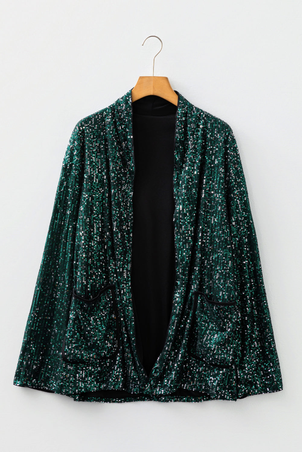 Top blazer à sequins vert sapin — col V ouvert, manches longues