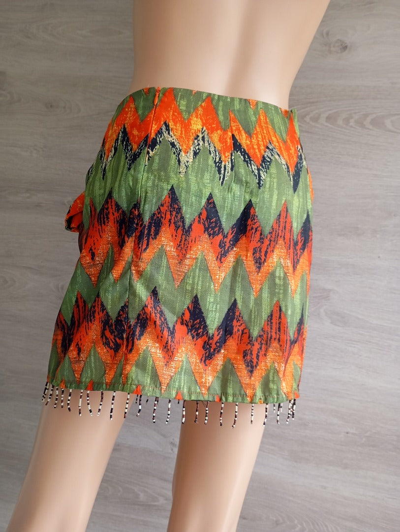 Mini-jupe portefeuille Micas - S - vert/orange avec perles - neuve