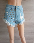 Shorts court fille femme en jeans bleu clair avec clous Xs très bon état avec franges